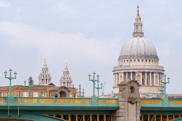 Fototapeta premium View of the Southwark Bridge and the famous Saint Paul's Cathedral in the background in London Uk 