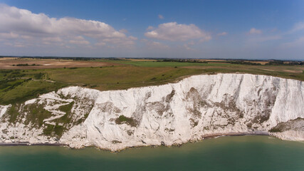 Aerial view of white cliffs of Dover, English Channel on a sunny summer day . - 584007139
