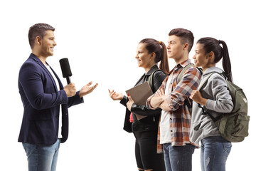 Male reporter interviewing a group of students