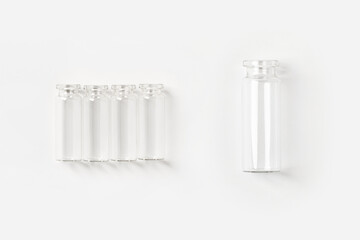 set of transparent empty jars on a light background.