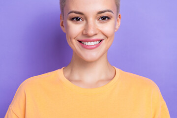 Close up cropped portrait of cheerful lovely person toothy beaming smile isolated on purple color background
