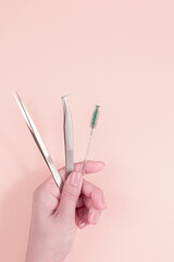 Different tools for eyelash extensions with space for inscriptions and care for them.