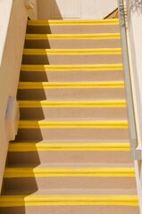Bright yellow stairs leading up