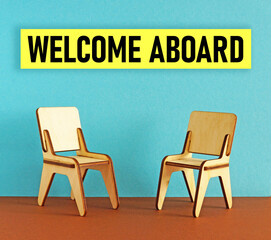 Welcome Aboard is shown using the text and photo of chairs