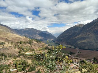 valley landscape with sky and clouds in peru