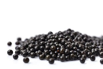 Black caviar in bulk on a white background. Elite exotic delicacy. AI generated.