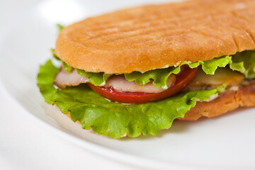 sandwich with ham and vegetables