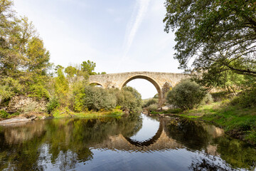 Fototapeta na wymiar Ponte de Sequeiros - Sequeiros medieval bridge over Côa river, Seixo do Côa e Vale Longo, municipality of Sabugal, district of Guarda, Portugal