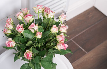bouquet of pink roses in vase close up ,natural flower background