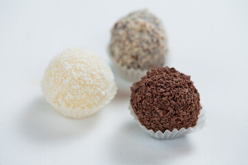 chocolate candies on white background