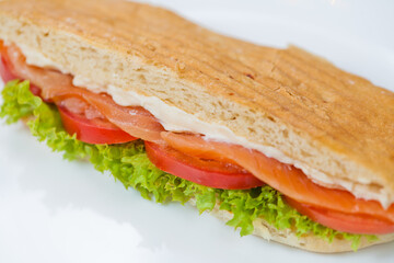 sandwich with salmon and vegetables