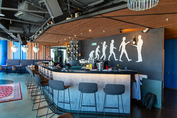Paris, France - April 01, 2021: Interior of a modern loft-style bar