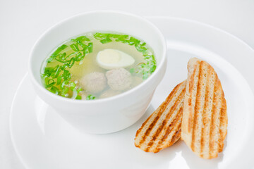 bowl of soup with bread