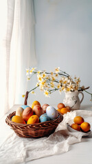 A straw basket with several colored eggs. light environment with flowers decorating.