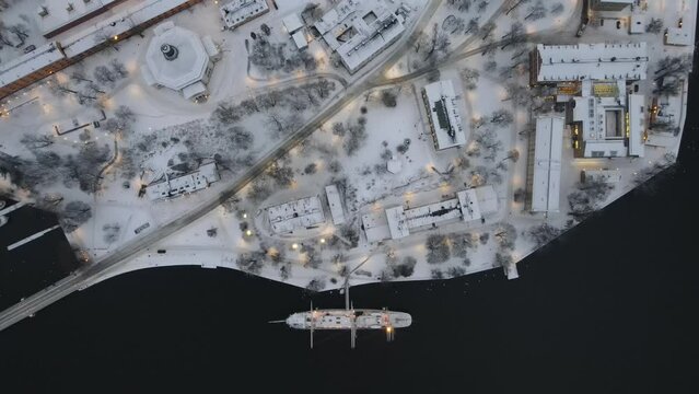 Aerial video of STF Af Chapman & Skeppsholmen Vandrarhem with a Persian ship in the background