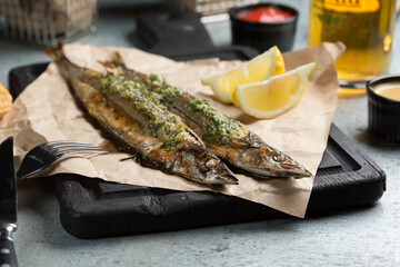 grilled fish with lemon and herbs