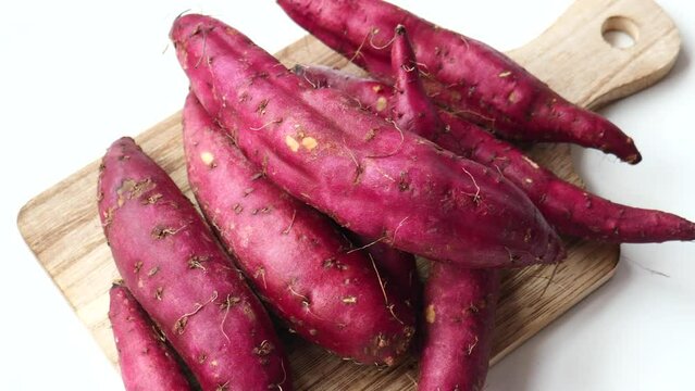 Close up of raw sweet potato in a bowl 