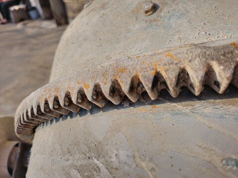 The gearing mechanism of the gearbox of a small concrete mixer.