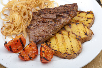 grilled steak with potatoes