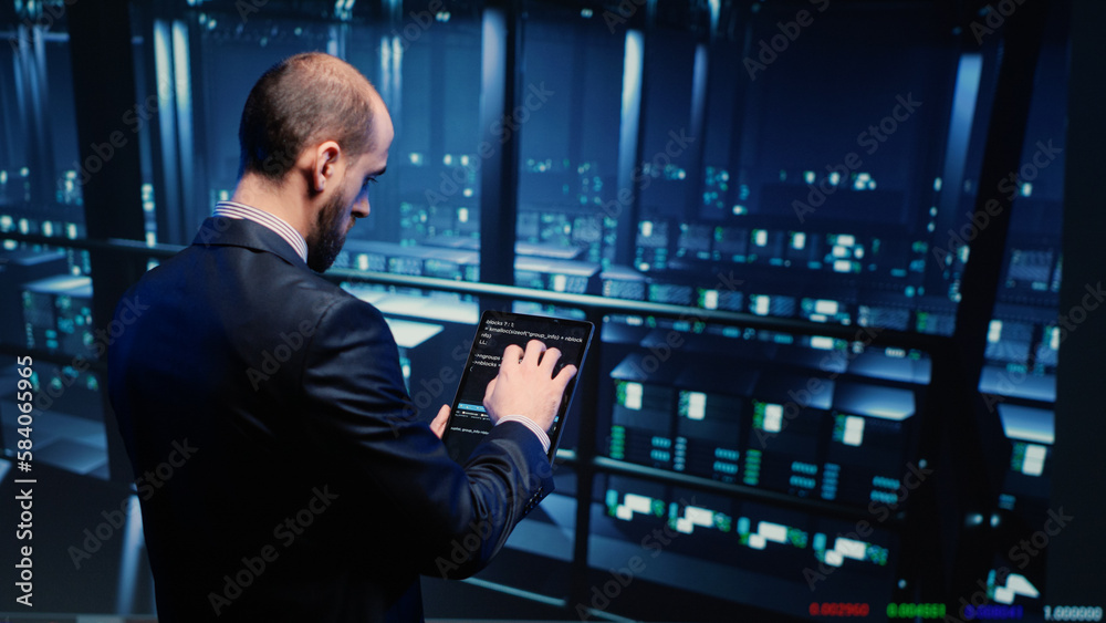 Poster datacenter engineer using tablet in modern server room, planning cluster computer service or hosting