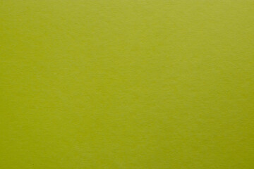 Yellow green colored tinted paper texture swatch.