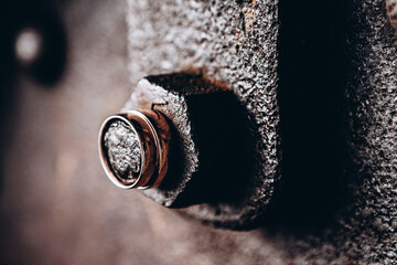 wedding rings, wedding rings on iron background