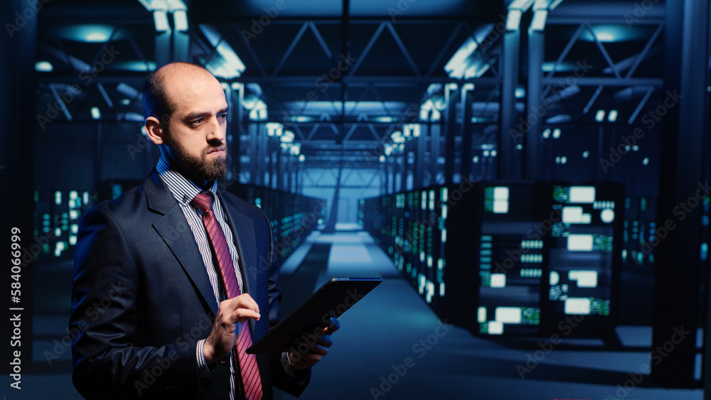 Poster it engineer using tablet in high tech server room, planning networking computer system. database adm