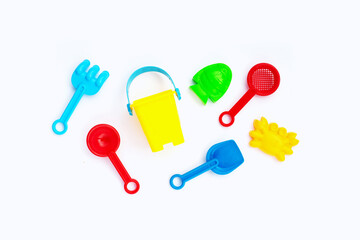Fototapeta na wymiar Plastic toys, shovels with bucket