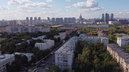 Aerial view of the Botkin Hospital in Moscow. Old houses against the backdrop of the business district. Roofs of Soviet houses