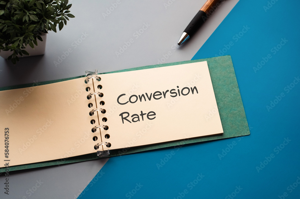 Poster there is a notebook with the word conversion rate. it is eye-catching image.