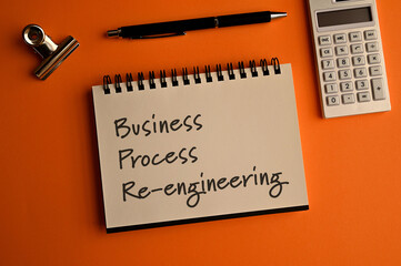 There is a notebook with the word Business Process Re-engineering. It is eye-catching image.