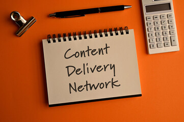 There is a notebook with the word Content Delivery Network. It is eye-catching image.