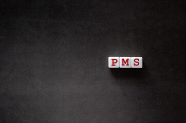 There is white cube with the word PMS. It is an abbreviation for Personal information protection management systems as eye-catching image.