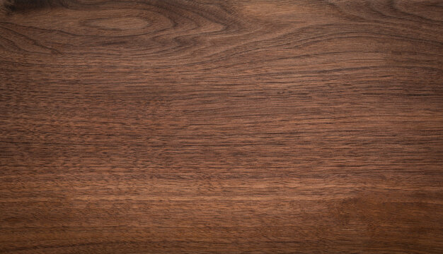 Wood texture. Walnut wood texture background. Wide format black walnut natural texture desktop background
