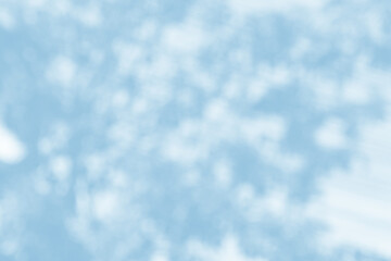 Light blue blurred bokeh abstract for background.