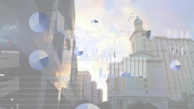 Animation of trading board and multiple graphs over low angle view of buildings against cloudy sky