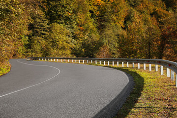 Picturesque view of empty road near trees