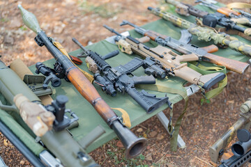 Gun weapons bags and bullets for Army marine corps soldier military war participating and preparing...