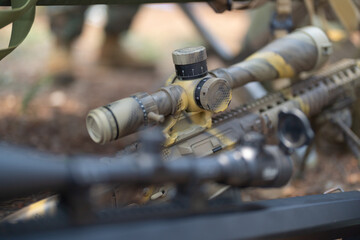 Gun weapons bags and bullets for Army marine corps soldier military war participating and preparing to attack the enemy in Thailand during Exercise Cobra Gold in battle. Combat force training.