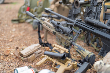 Gun weapons bags and bullets for Army marine corps soldier military war participating and preparing to attack the enemy in Thailand during Exercise Cobra Gold in battle. Combat force training.