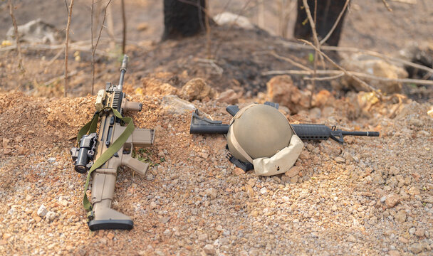 Gun weapons bags and bullets for Army marine corps soldier military war participating and preparing to attack the enemy in Thailand during Exercise Cobra Gold in battle. Combat force training.