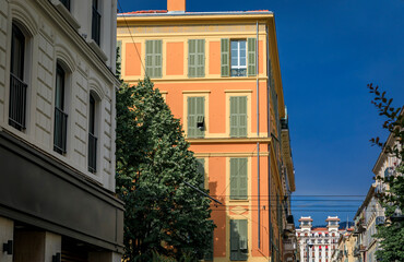 Traditional Mediterranean houses, ornate metal work and shutters in Nice, France