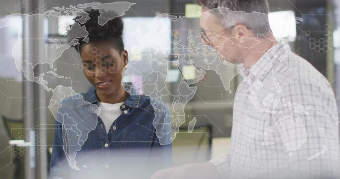 Animation of world map and data processing over diverse business people - Powered by Adobe