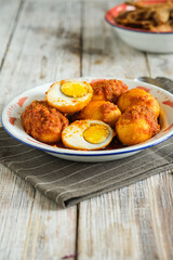 telur balado or spicy egg is traditional popular food made from boiled egg with tomato and paste...