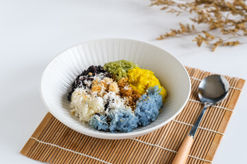 ketan unti kelapa is sticky rice with shredded coconut and brown sugar