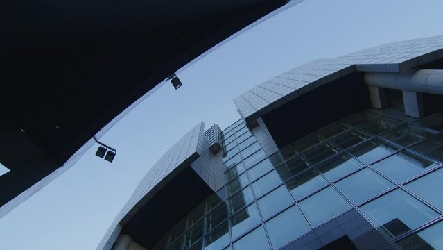 Looking Up On Modern Building With Glass Exterior In Paris, France. - low angle