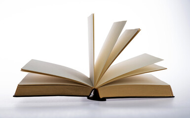 Open book on white background