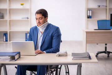 Fototapeta premium Young male employee after car accident at workplace