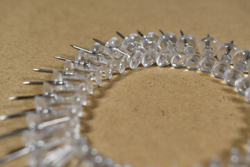 thumbtacks in a neat row