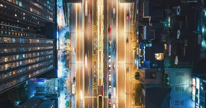 aerial top view urban cityscape timelapse of traffic on the road with high buildings modern city of Chengdu China